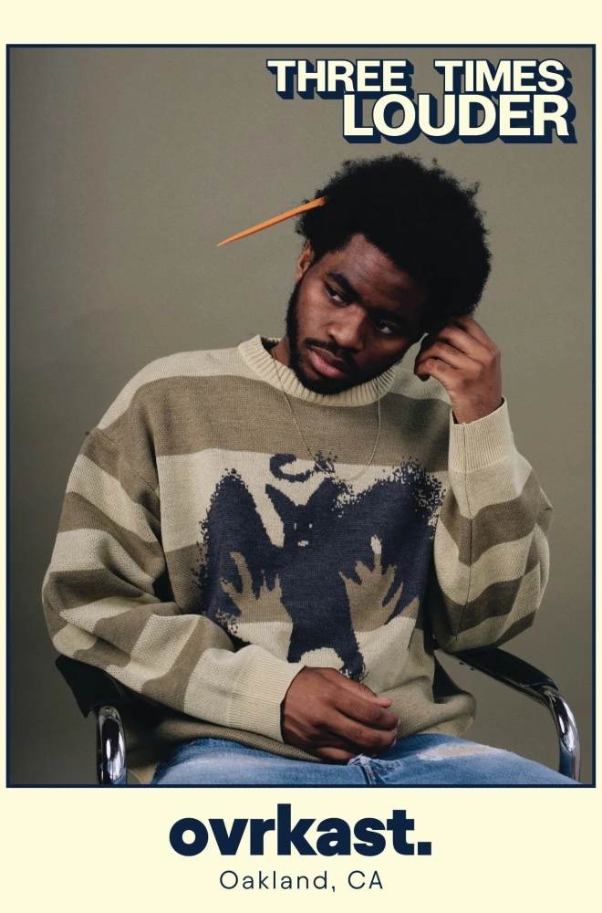 A person in a striped sweater with a graphic design sits in a chair, leaning forward with a contemplative expression and a pencil behind their ear. The image has a vintage style with "THREE TIMES LOUDER" text and "ovrkast. Oakland, CA" at the bottom.
